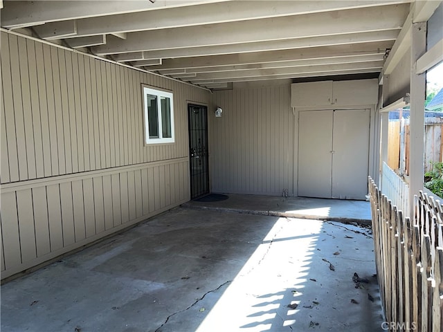 view of patio / terrace featuring a carport