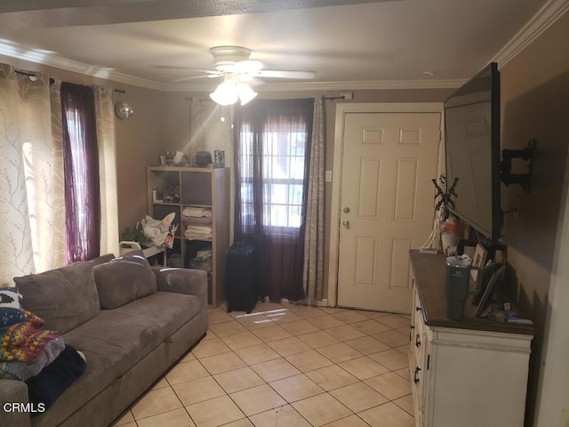 living room with ceiling fan, light tile patterned flooring, and ornamental molding