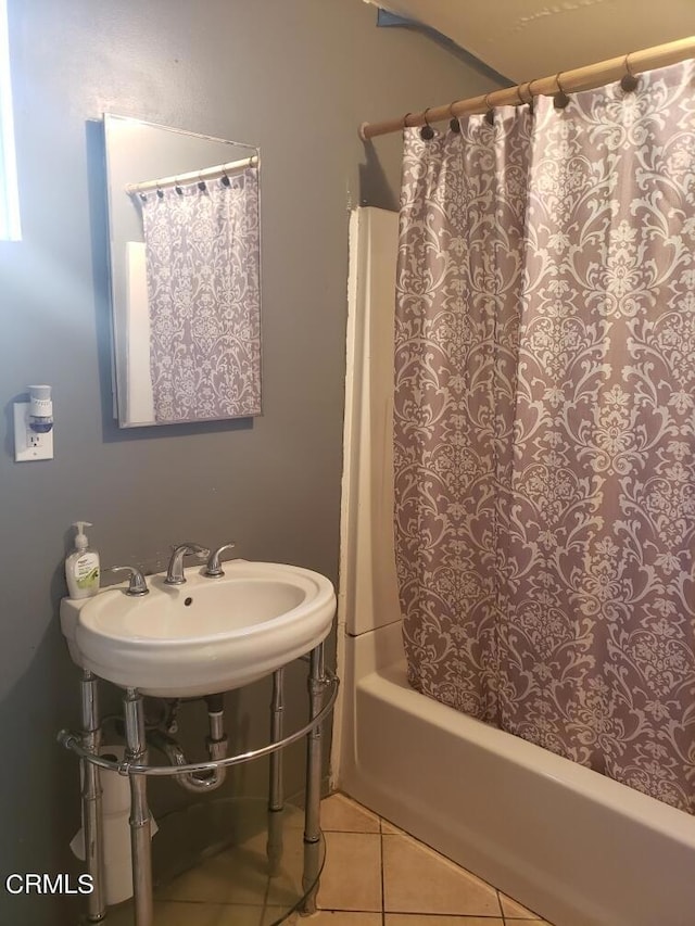 4134 Maris Ave, Pico Rivera, CA 90660 - full bath with tile patterned floors, shower / bathtub combination with curtain, and a sink