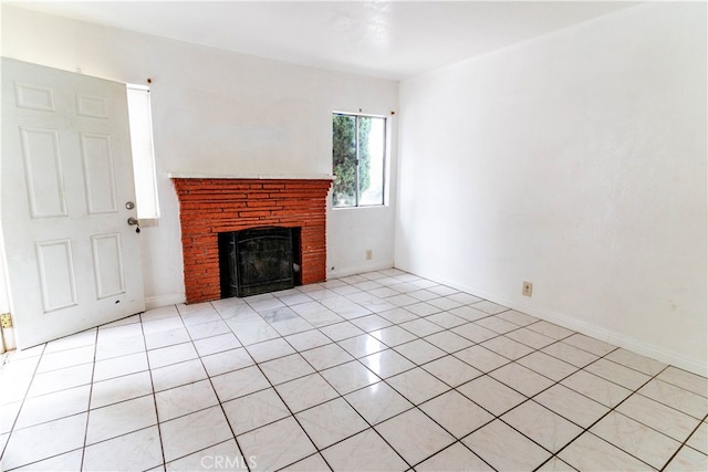 unfurnished living room featuring light tile patterned flooring and a fireplace