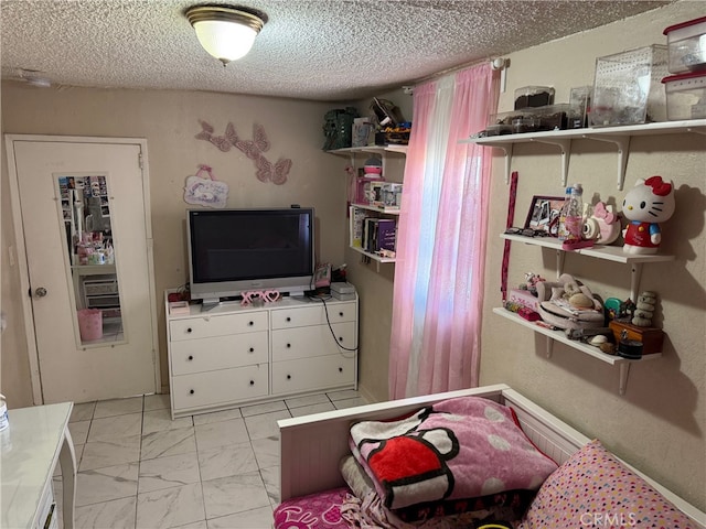 bedroom with a textured ceiling