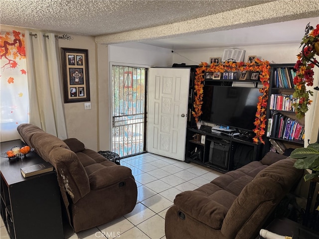 tiled living room with a textured ceiling