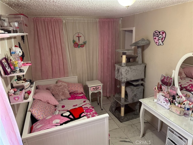 bedroom with a textured ceiling