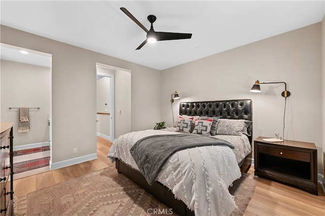 bedroom featuring light hardwood / wood-style flooring and ceiling fan