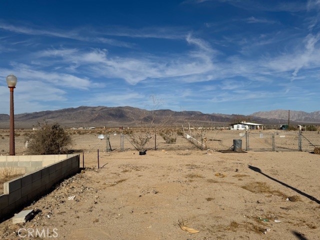 mountain view featuring a rural view