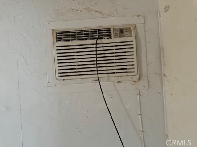 room details featuring a wall mounted AC