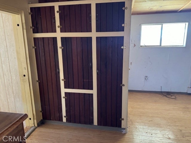 interior space with hardwood / wood-style floors