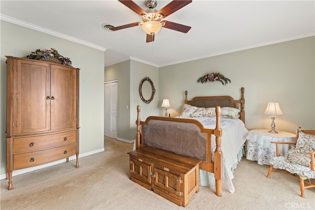 carpeted bedroom with crown molding, a closet, and ceiling fan