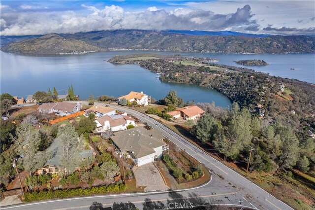 bird's eye view with a water and mountain view