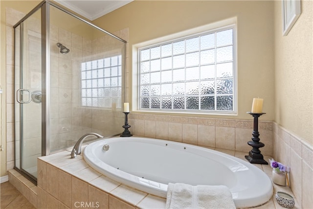 bathroom featuring crown molding, tile patterned flooring, separate shower and tub, and a wealth of natural light