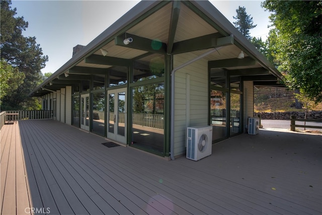 deck featuring ac unit