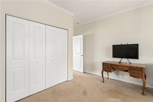 unfurnished office with ornamental molding and light colored carpet