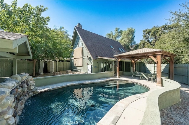 view of pool featuring a gazebo and a patio area