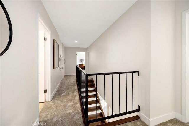 corridor featuring carpet flooring