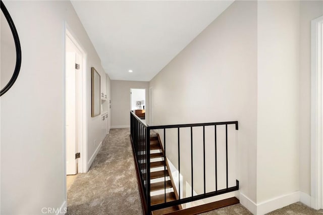 7385 Darnoch Way, West Hills, CA 91307 - hallway featuring an upstairs landing, carpet flooring, and recessed lighting