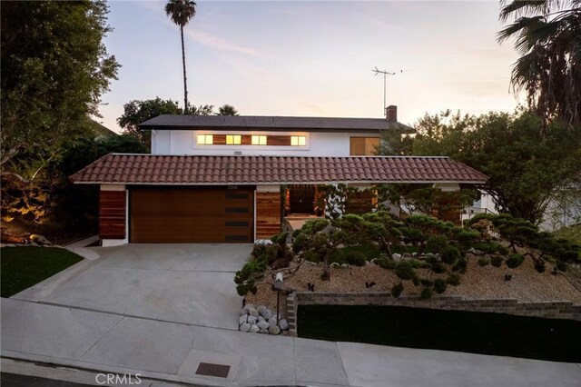 view of front of home featuring a garage