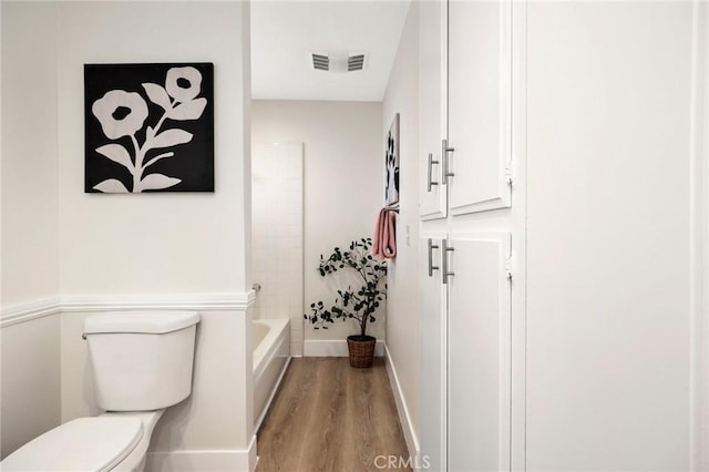 7385 Darnoch Way, West Hills, CA 91307 - bathroom featuring wood finished floors and shower / tub combination