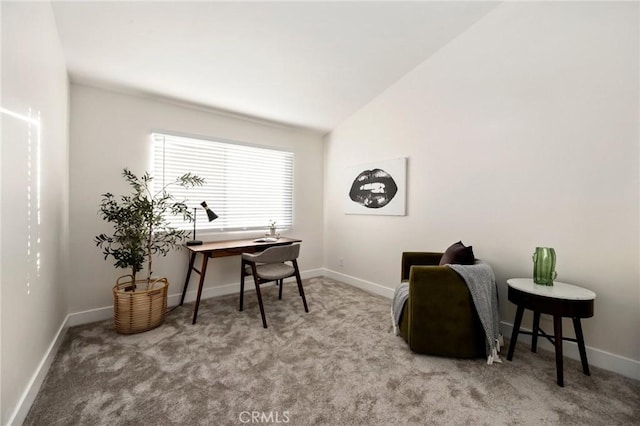 office featuring light colored carpet and lofted ceiling