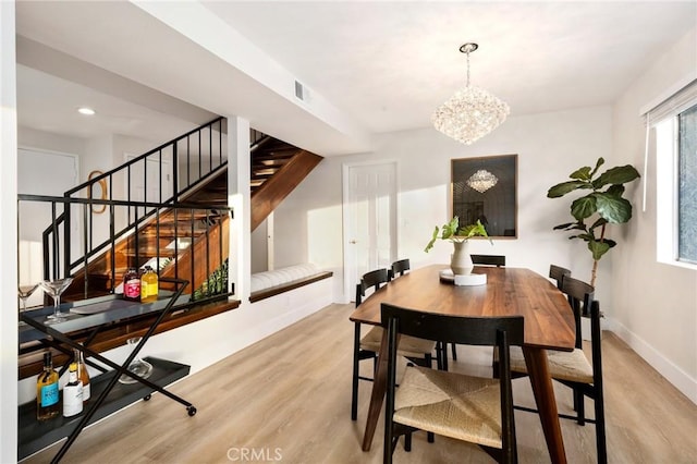 7385 Darnoch Way, West Hills, CA 91307 - dining area featuring stairway, light wood-style flooring, a chandelier, and recessed lighting