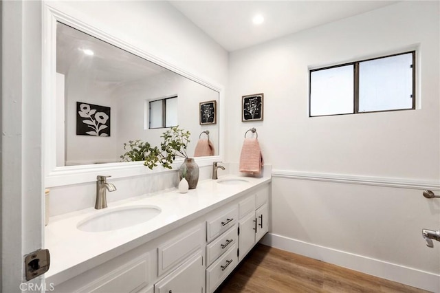 7385 Darnoch Way, West Hills, CA 91307 - full bath featuring double vanity, wood finished floors, and recessed lighting