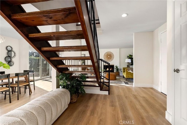 7385 Darnoch Way, West Hills, CA 91307 - stairway featuring wood finished floors and recessed lighting