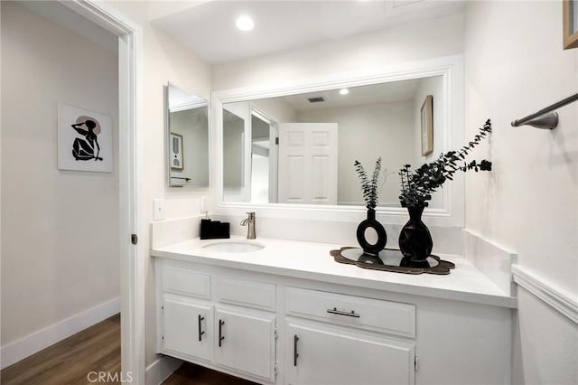 7385 Darnoch Way, West Hills, CA 91307 - bathroom featuring vanity and wood finished floors