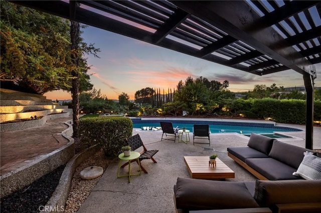 pool at dusk with an outdoor living space, a patio area, and a pergola