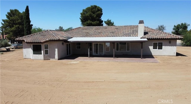 rear view of house with a patio