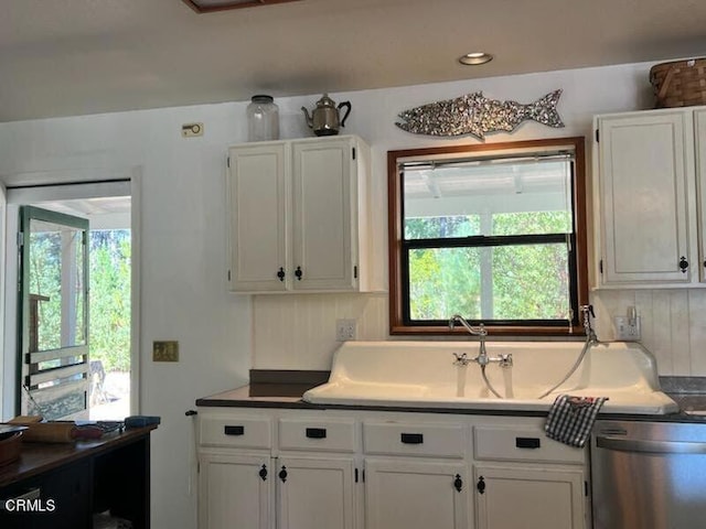 kitchen with white cabinetry and dishwasher