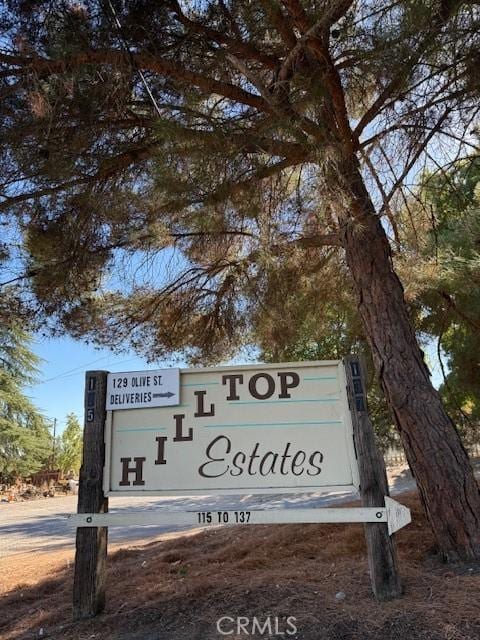 view of community sign