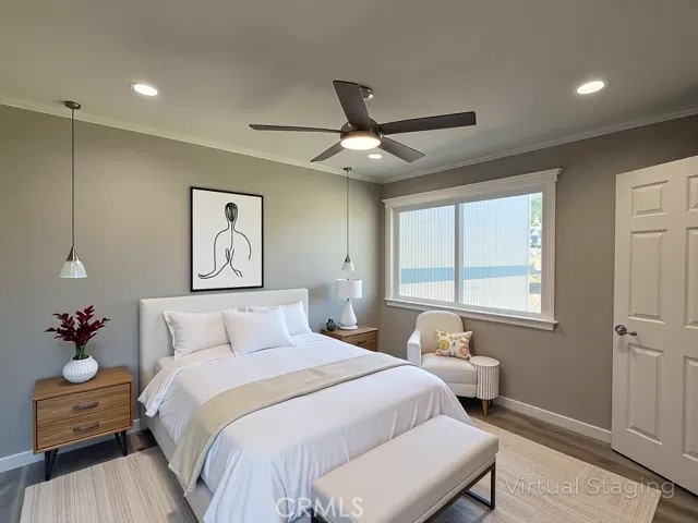 bedroom featuring recessed lighting, baseboards, ornamental molding, and wood finished floors