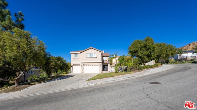 view of property featuring a garage