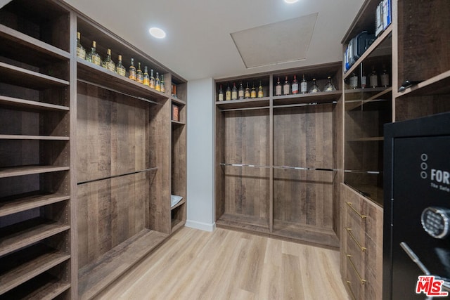 spacious closet with light wood-type flooring