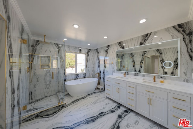 bathroom with plus walk in shower, ornamental molding, and vanity