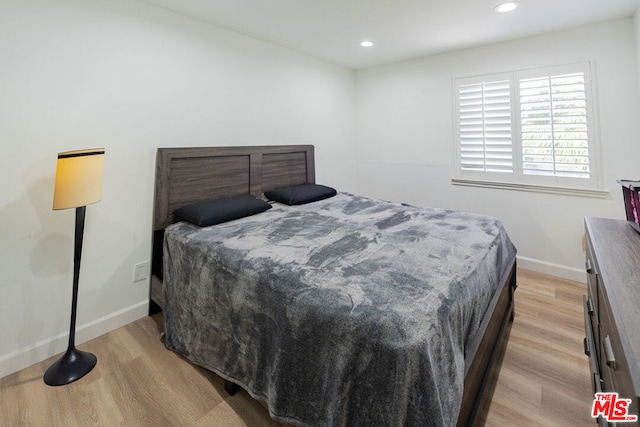 bedroom featuring light hardwood / wood-style floors