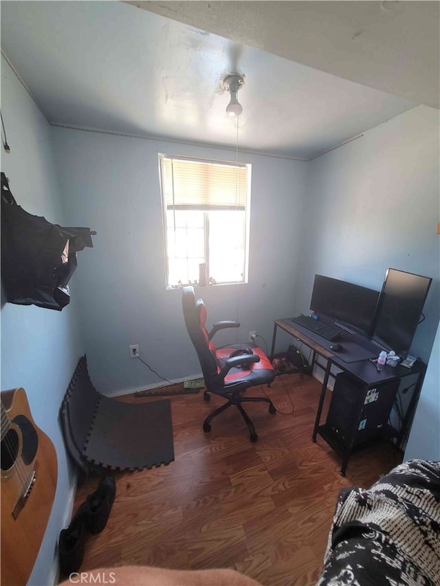 office area with hardwood / wood-style floors