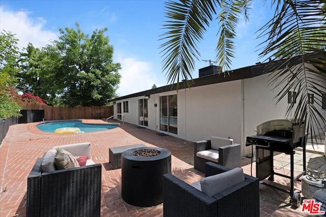 view of swimming pool featuring a patio