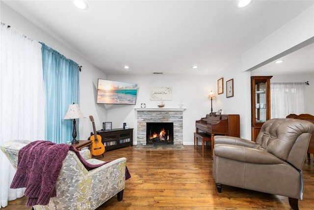16132 Landmark Dr, Whittier, CA 90604 - living room with hardwood / wood-style flooring and a fireplace