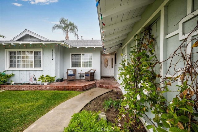 16132 Landmark Dr, Whittier, CA 90604 - doorway to property featuring a patio area and a yard