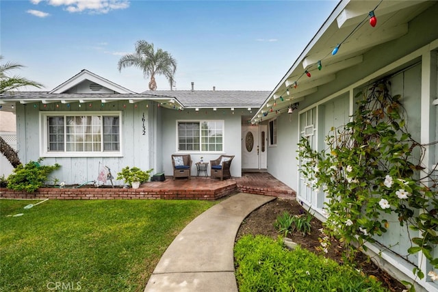 16132 Landmark Dr, Whittier, CA 90604 - view of front of home with a front lawn and a patio area