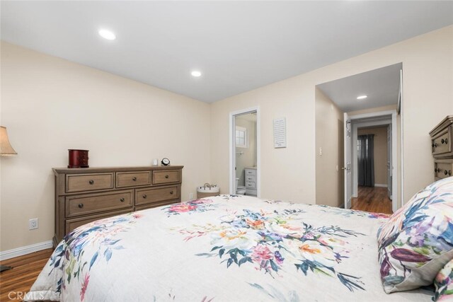 16132 Landmark Dr, Whittier, CA 90604 - bedroom featuring dark hardwood / wood-style floors and connected bathroom