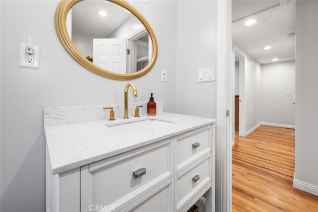 16132 Landmark Dr, Whittier, CA 90604 - bathroom with hardwood / wood-style floors and vanity