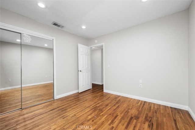 16132 Landmark Dr, Whittier, CA 90604 - unfurnished bedroom featuring wood-type flooring and a closet