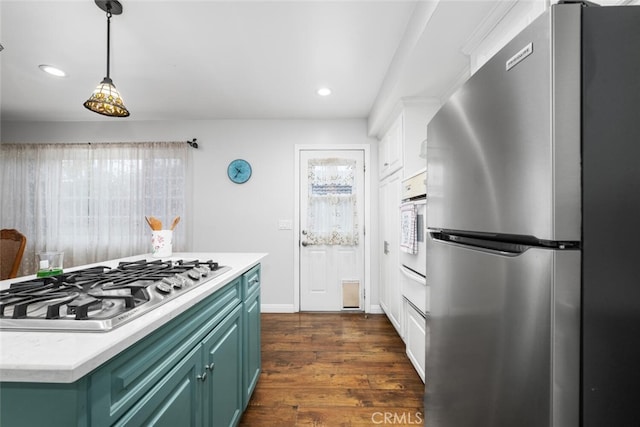 16132 Landmark Dr, Whittier, CA 90604 - kitchen with stainless steel appliances, green cabinetry, and dark wood-type flooring