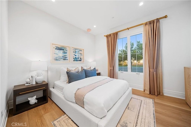 bedroom featuring light hardwood / wood-style flooring