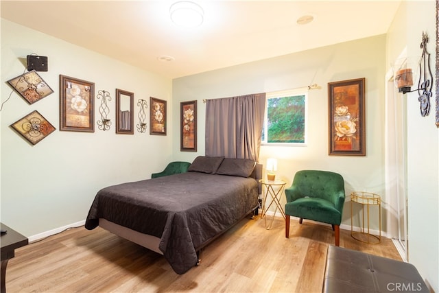 bedroom featuring light wood-type flooring