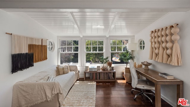 sunroom with lofted ceiling with beams