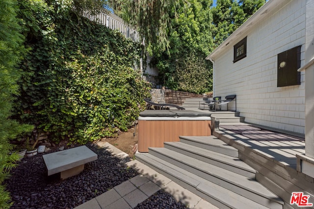 view of patio featuring a hot tub