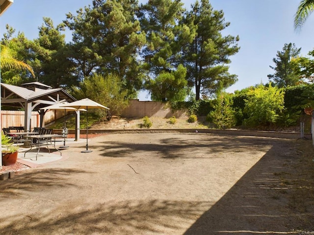 view of property's community featuring a patio