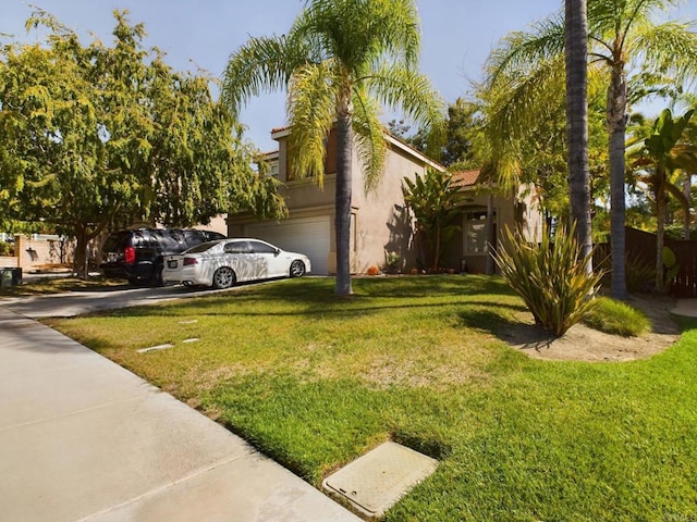 view of yard featuring a garage